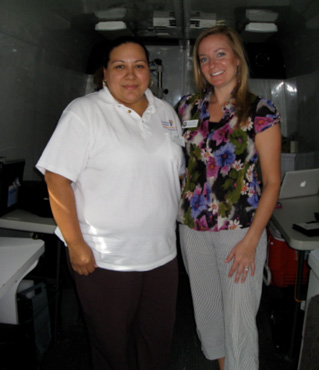 Carmen Arguijo and Holly Merrill Raschein at Key Largo K-8 Center