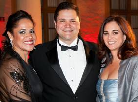 Jeannie Reinoso, Board Director Humberto Gonzalez and Isabel Chica
