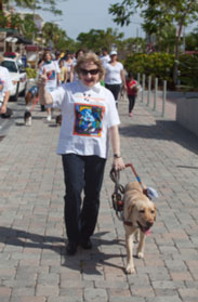 CEO Virginia Jacko and guide dog Kieran
