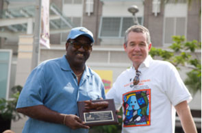Commissioner Dennis Moss is thanked for being Classy Canine Sponsor