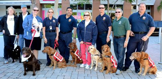 Janice Bartleson, David Bannister, Margot Mankes Aide to County Commissioner Sally Heyman, CEO Virginia Jacko, Miami-Dade County Public Defender Carlos Martinez, with Miami-Dade Fire Rescue Urban Search and Rescue Team.