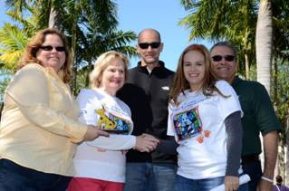 Lenor Ryan and Samantha Fass of the Shops at Midtown Miami, CEO Virginia Jacko, Chairman of the Board Agustin Arellano Jr. and Public Defender Carlos Martinez
