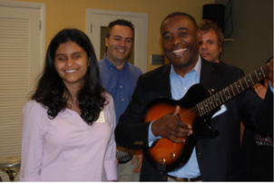 Commissioner Monestime with music program assistant instructor Natalia Sulca