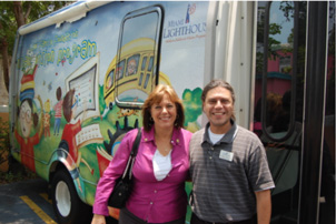 Commissioner Lynda Bell tours Heiken mobile unit with Dr. Bryan Wolynski