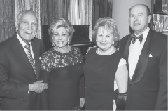 Gus and Lilliam Machado, CEO Virginia Jacko, and Board Director George Foyo