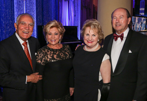 Gus and Lilliam Machado, CEO Virginia Jacko, and Board Director George Foyo
