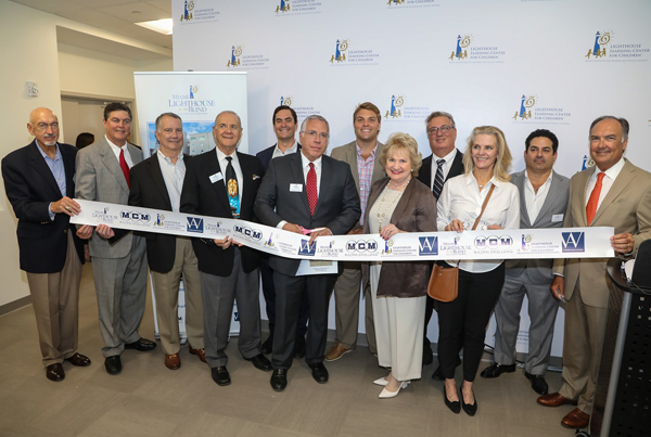 2017 Board of Directors at the Lighthouse Learning Center for Children™ Building Dedication Ribbon Cutting Ceremony with Dr. Eduardo Alfonso, Chairman of Bascom Palmer Eye Institute.