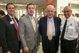 Board Director Scott Richey, Rotarian Oliver Ruiz, City of Miami Mayor Tomas Regalado and Assistant Fire Chief Eloy Garcia