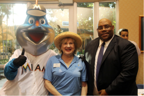 Billy the Marlin, CEO Virginia Jacko and Julius Davis, District Administrator, Division of Blind Services