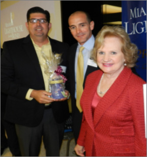 Visionary of the Year State Representative Manny Diaz Jr. with President & CEO Virginia Jacko Chairman of the Board Agustin Arellano, Jr.