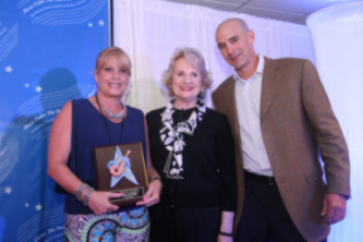 Mary Ferreiro of the Office of Miami-Dade County Commissioner Sally Heyman, CEO Virginia Jacko, Board Chairman Agustin Arellano, Jr.